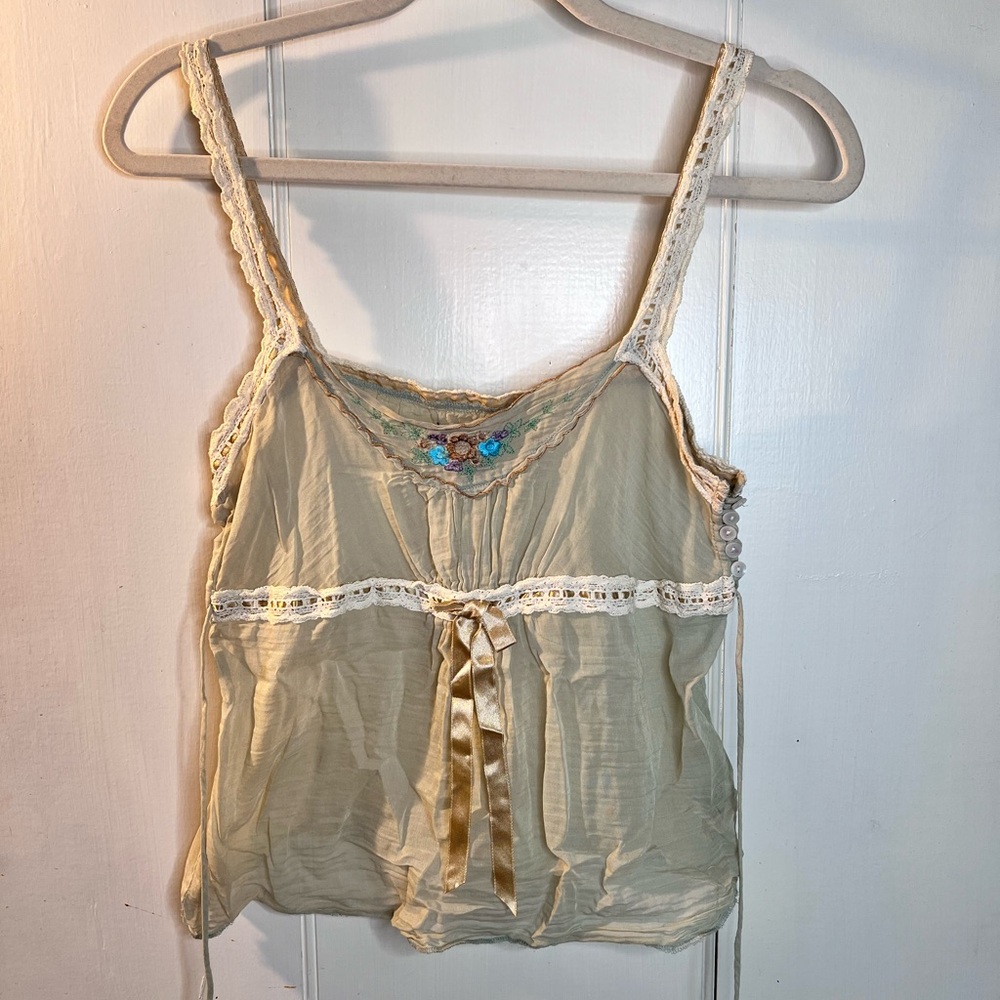 Free people cotton tank top. Sheer sage green with embroidered flowers. Size 8.
